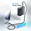 Cable PD 240W Toocki con carga rápida conectado a un cargador de pared y a una laptop